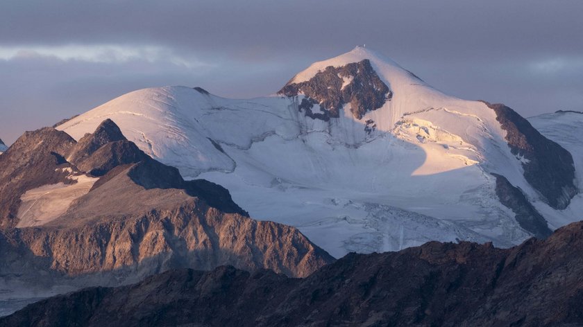 The Ötztal Alps Snow-covered mountain peak in sunset light with shadows